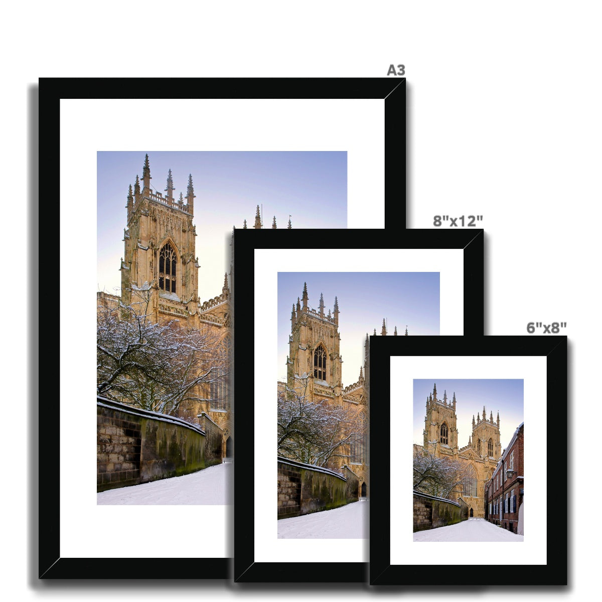 York Minster in the snow seen from Precentors Court. York, UK. Framed & Mounted Print