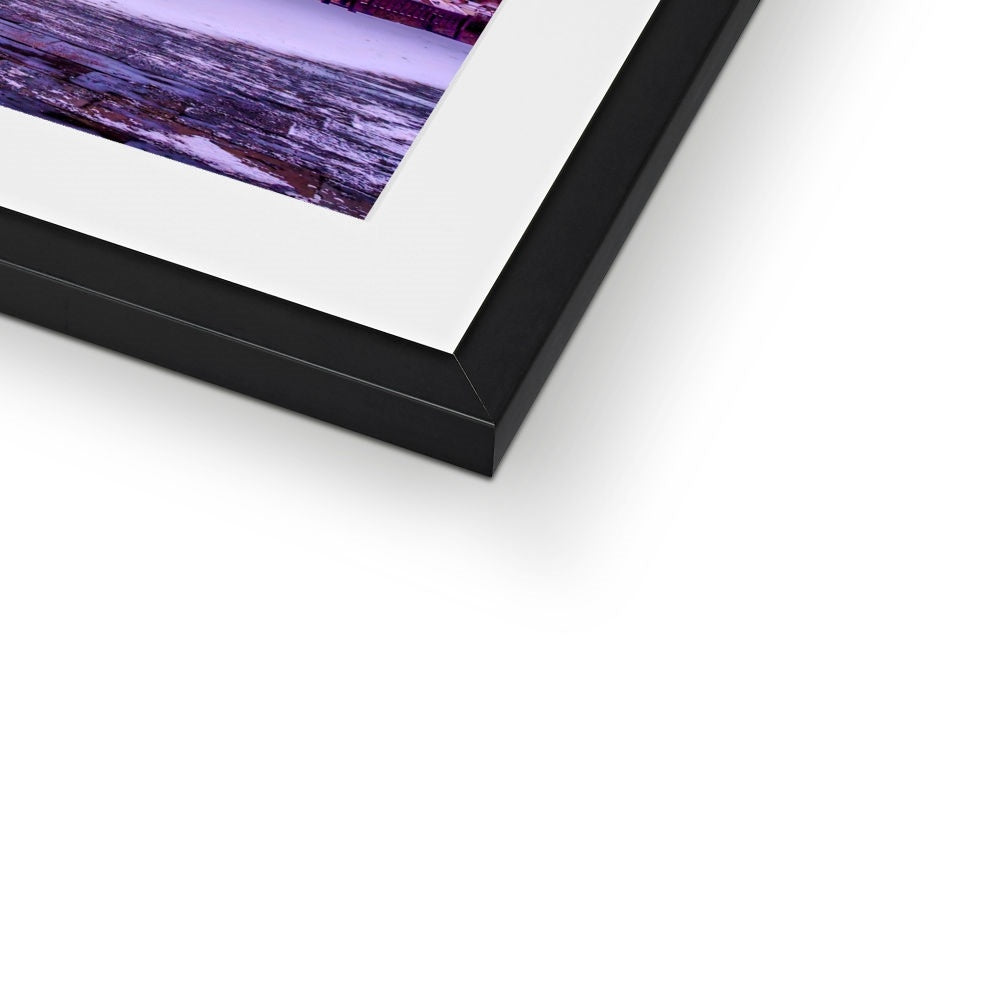 Whalebone Arch and view of Whitby Abbey in snow, Whitby, UK. Framed & Mounted Print