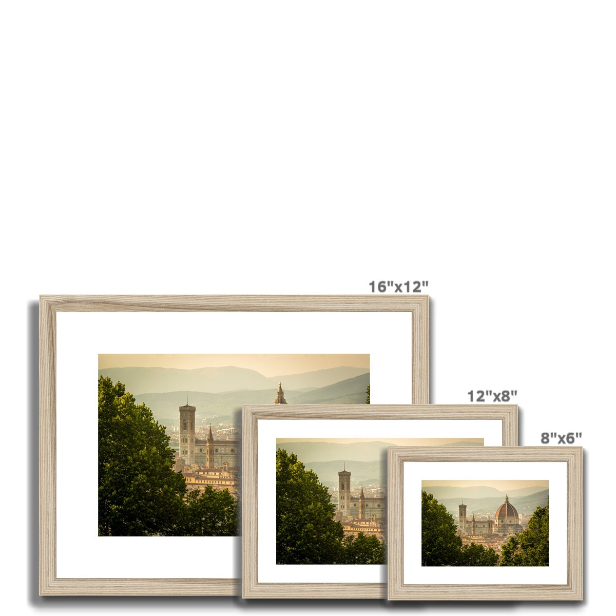 The south façade of Florence Cathedral glimpsed through the trees of San Miniato al Monte.  Italy. Framed & Mounted Print