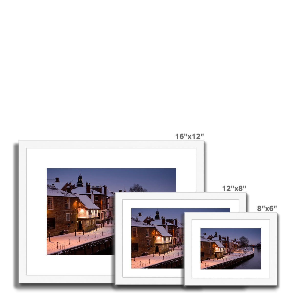 The Kings Arms pub and River Ouse in the snow at dusk, York, UK. Framed & Mounted Print