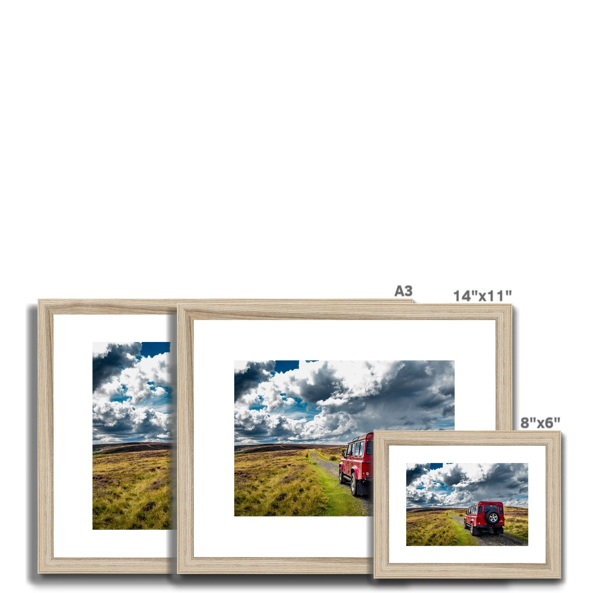 Red Land Rover Defender 110 4WD car navigating a Green Lane track, North Yorkshire Moors, UK. Framed & Mounted Print