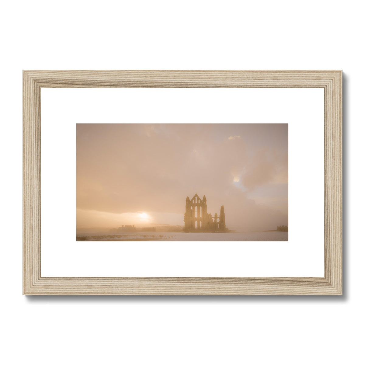 Whitby Abbey in snow, North Yorkshire. UK Framed & Mounted Print