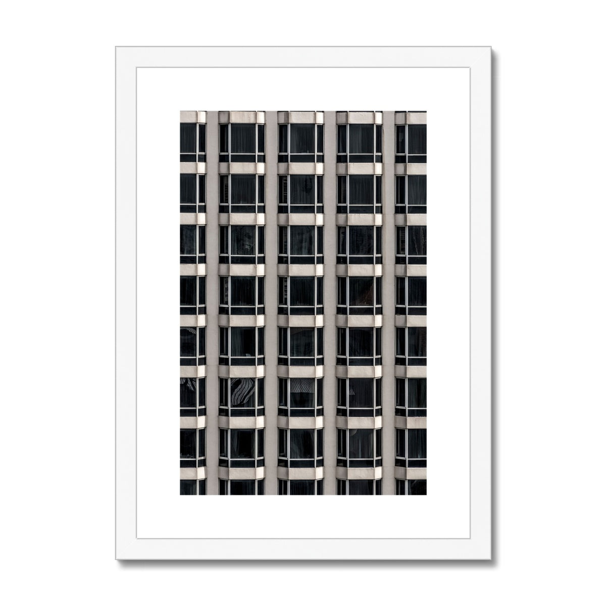 Geometric patterns of a modern urban high-rise facade Framed & Mounted Print
