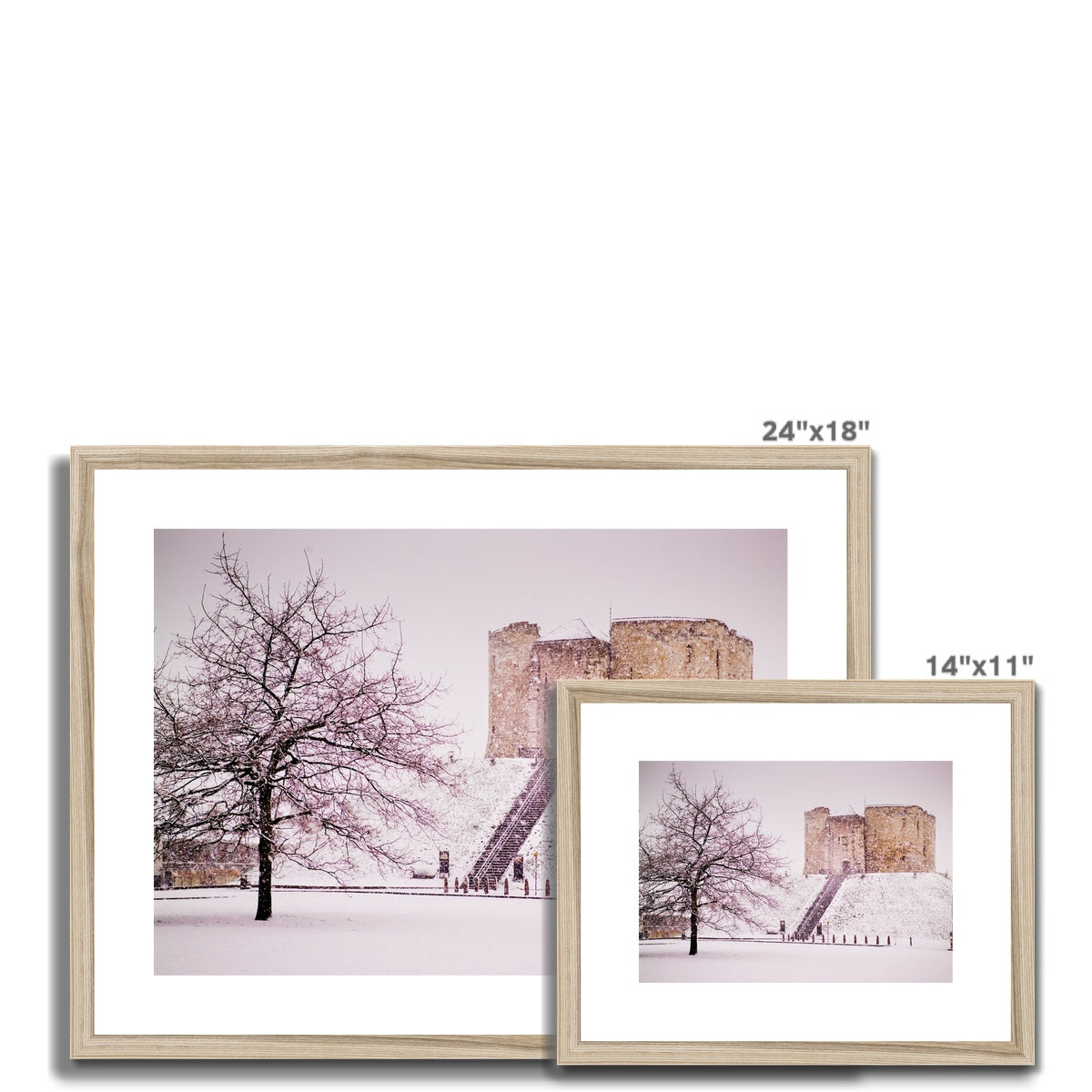 Clifford's Tower in snow blizzard, York, UK Framed & Mounted Print