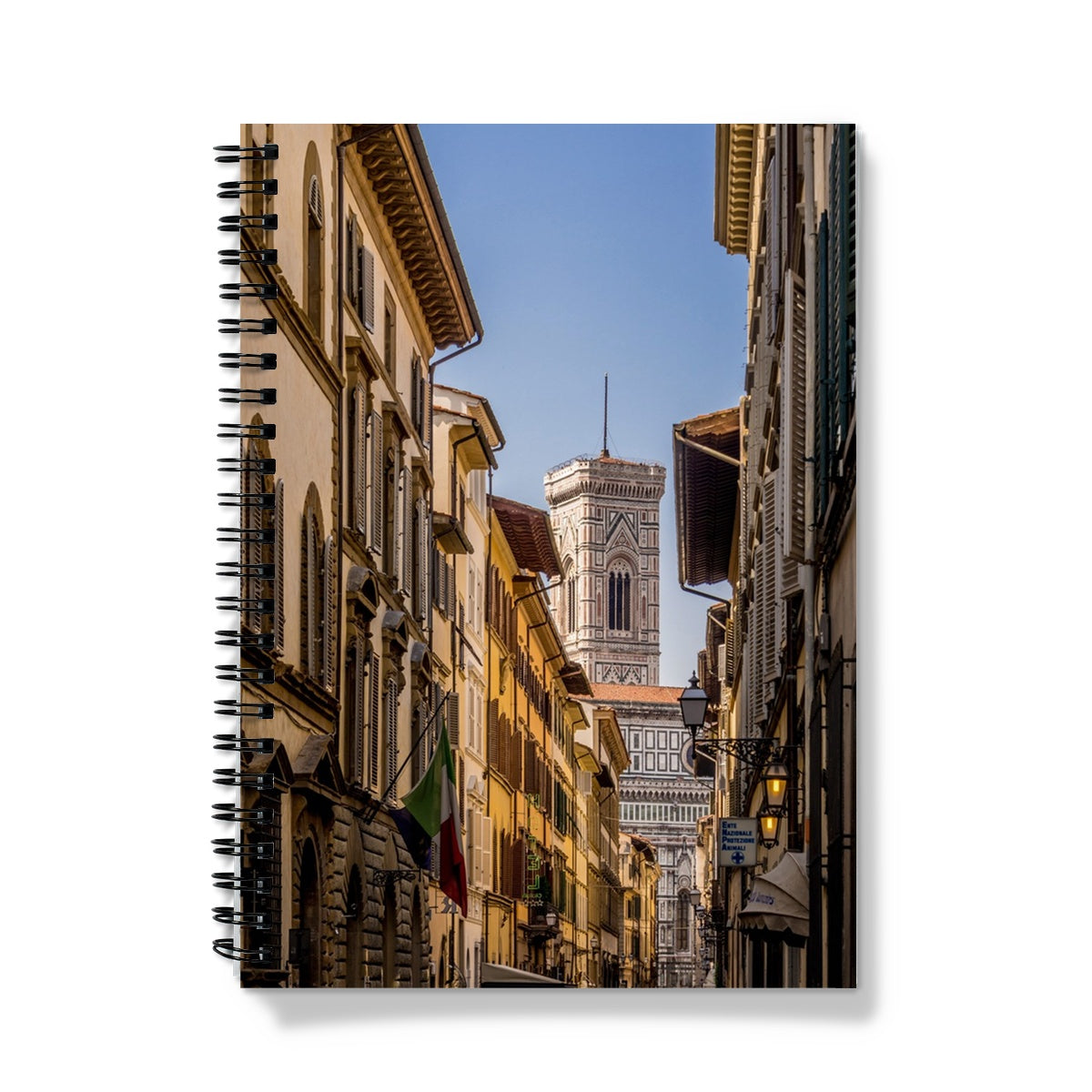Giotto's Campanile glimpsed between buildings in the city of Florence, Italy. Notebook