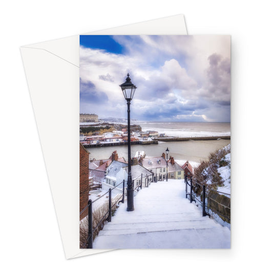 Snow covered steps leading down from St Mary's Church, Whitby, UK. Greeting Card