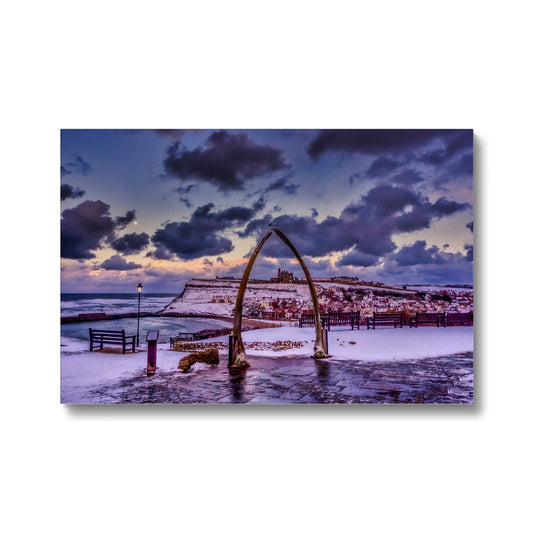 Whalebone Arch and view of Whitby Abbey in snow, Whitby, UK. Canvas