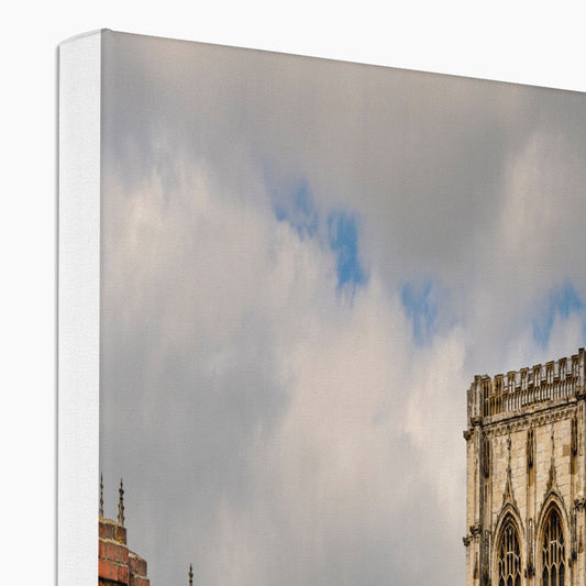 York Minster stands timeless amidst the city's rooftops. York. UK Canvas