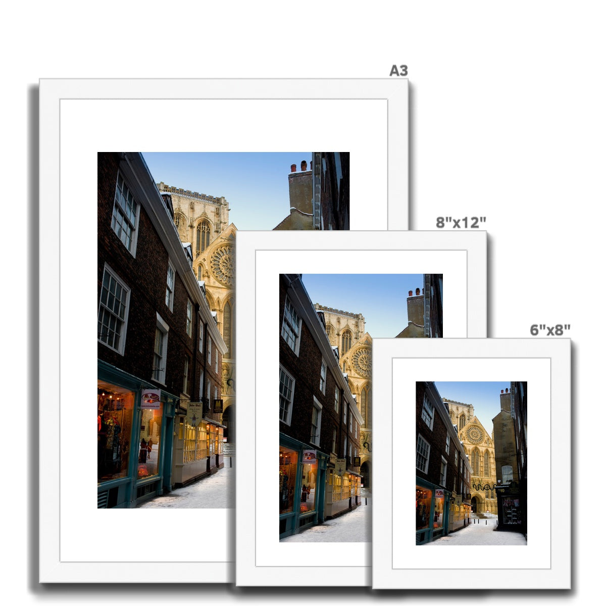 South entrance to York Minster with the Rose window seen from Minster Gates in the snow, York, UK. Framed & Mounted Print