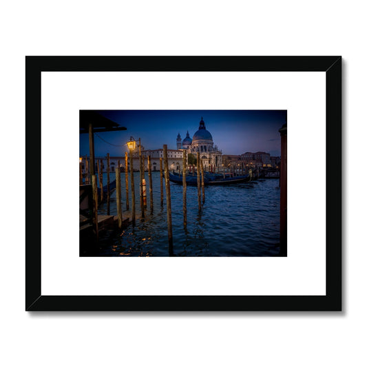 Gondolas moored for the night on the Grand Canal with the church of Santa Maria della Salute in the background. Venice, Italy. - Framed & Mounted Print