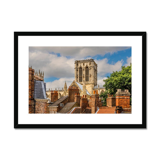 York Minster stands timeless amidst the city's rooftops. York. UK Framed & Mounted Print