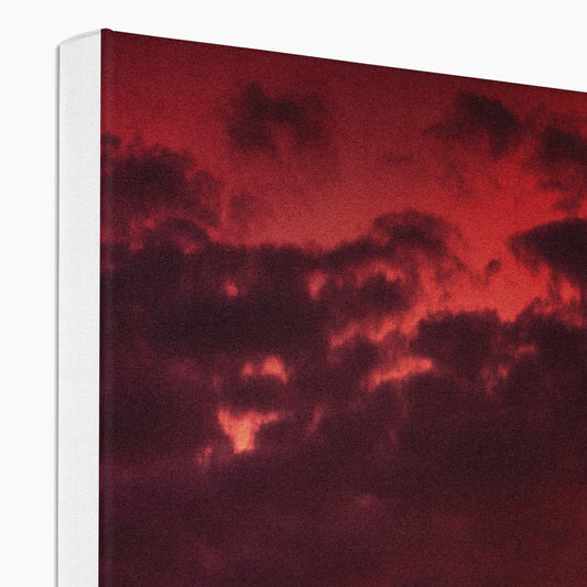 York Minster silhouetted against an orange sky at sunrise Canvas