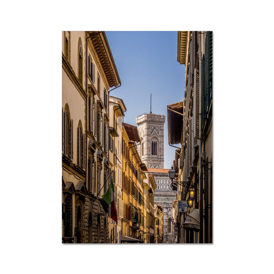 Giotto's Campanile glimpsed between buildings in the city of Florence, Italy. Fine Art Print