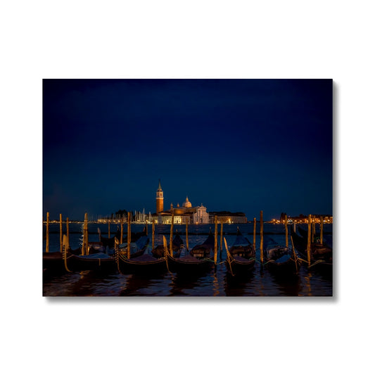 Gondolas moored in St Mark's Basin with San Giorgio Maggiore in the background at night, Venice, Italy. Canvas