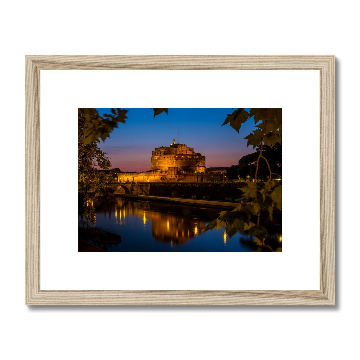 Castel sant'Angelo on the banks of the river tiber at night, Rome, Italy. Framed & Mounted Print