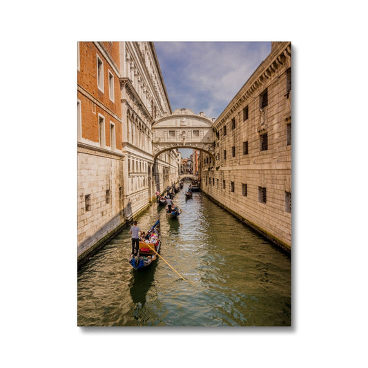 Gondolas passing under the Bridge of sighs. Venice. Italy. Canvas