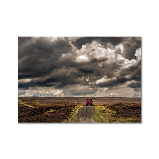 Red Land Rover Defender 110 4WD car on a Green Lane track, North Yorkshire Moors, UK. Fine Art Print