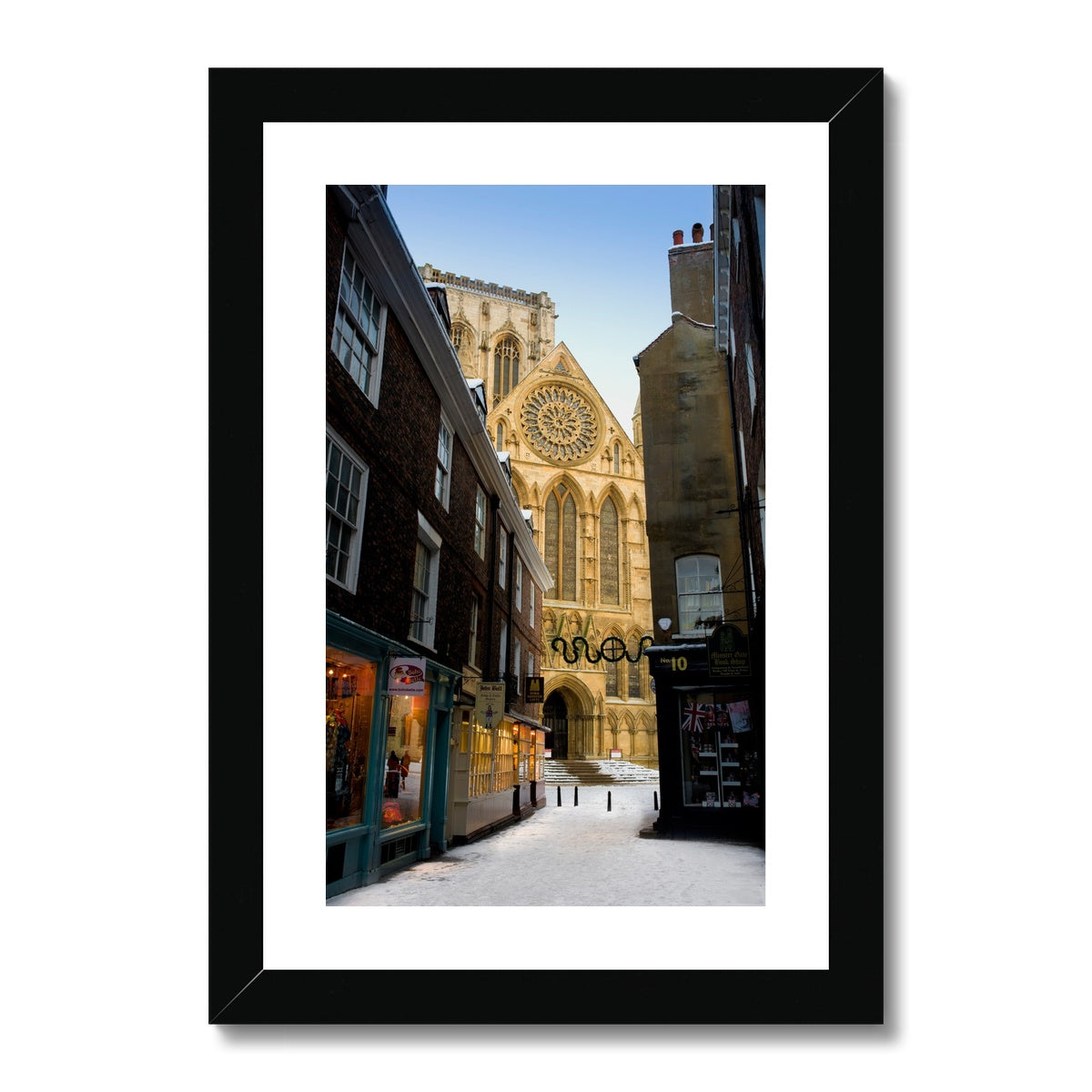 South entrance to York Minster with the Rose window seen from Minster Gates in the snow, York, UK. Framed & Mounted Print