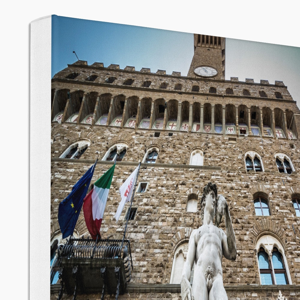 Statue of David overlooking Piazza della Signoria, with Palazzo Vecchio behind. Florence, Italy. Canvas