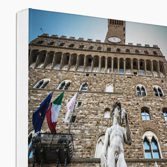 Statue of David overlooking Piazza della Signoria, with Palazzo Vecchio behind. Florence, Italy. Canvas