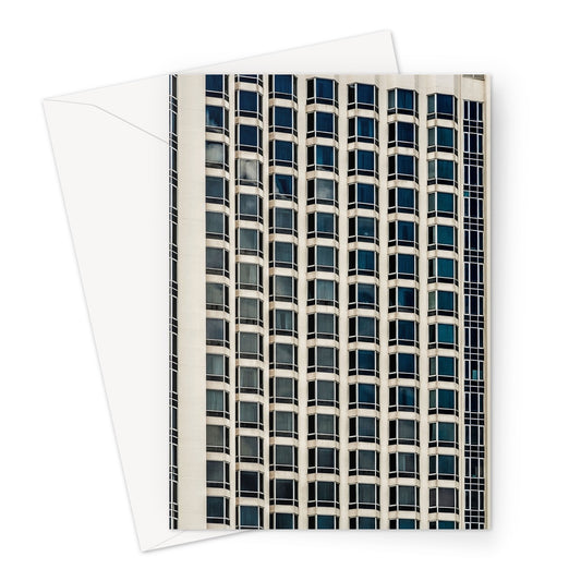 Symmetrical pattern of windows on contemporary skyscraper Greeting Card