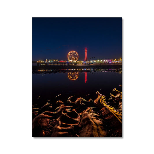 Blackpool Tower and Central Pier at night, with reflection of illuminations in water on the beach  UK. Canvas