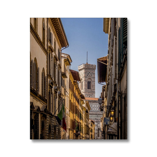 Giotto's Campanile glimpsed between buildings in the city of Florence, Italy. Canvas