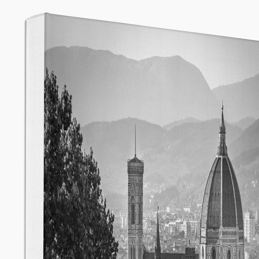 The south façade of Florence Cathedral glimpsed through the trees of San Miniato al Monte. Italy.  Canvas