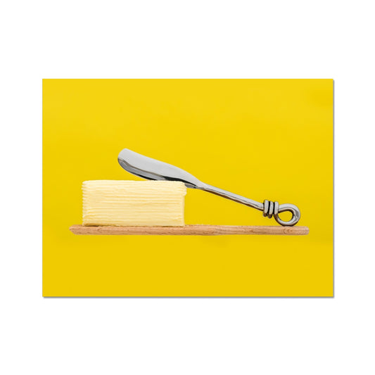 Homemade butter on wooden paddle with butter knife and yellow background. Fine Art Print