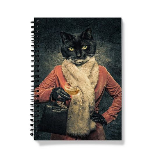 Anthropomorphic cat spilling drink from champagne coupe Notebook