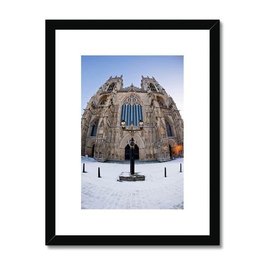Fish eye shot of the West front of York Minster in snow Framed & Mounted Print