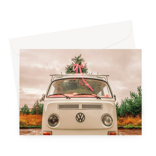1972 VW Bay Window Campervan parked with with Christmas tree on roof. Greeting Card