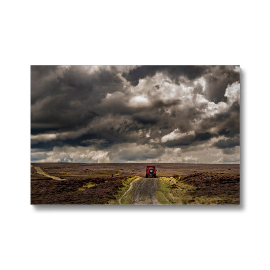 Red Land Rover Defender 110 4WD car on a Green Lane track, North Yorkshire Moors, UK. Canvas