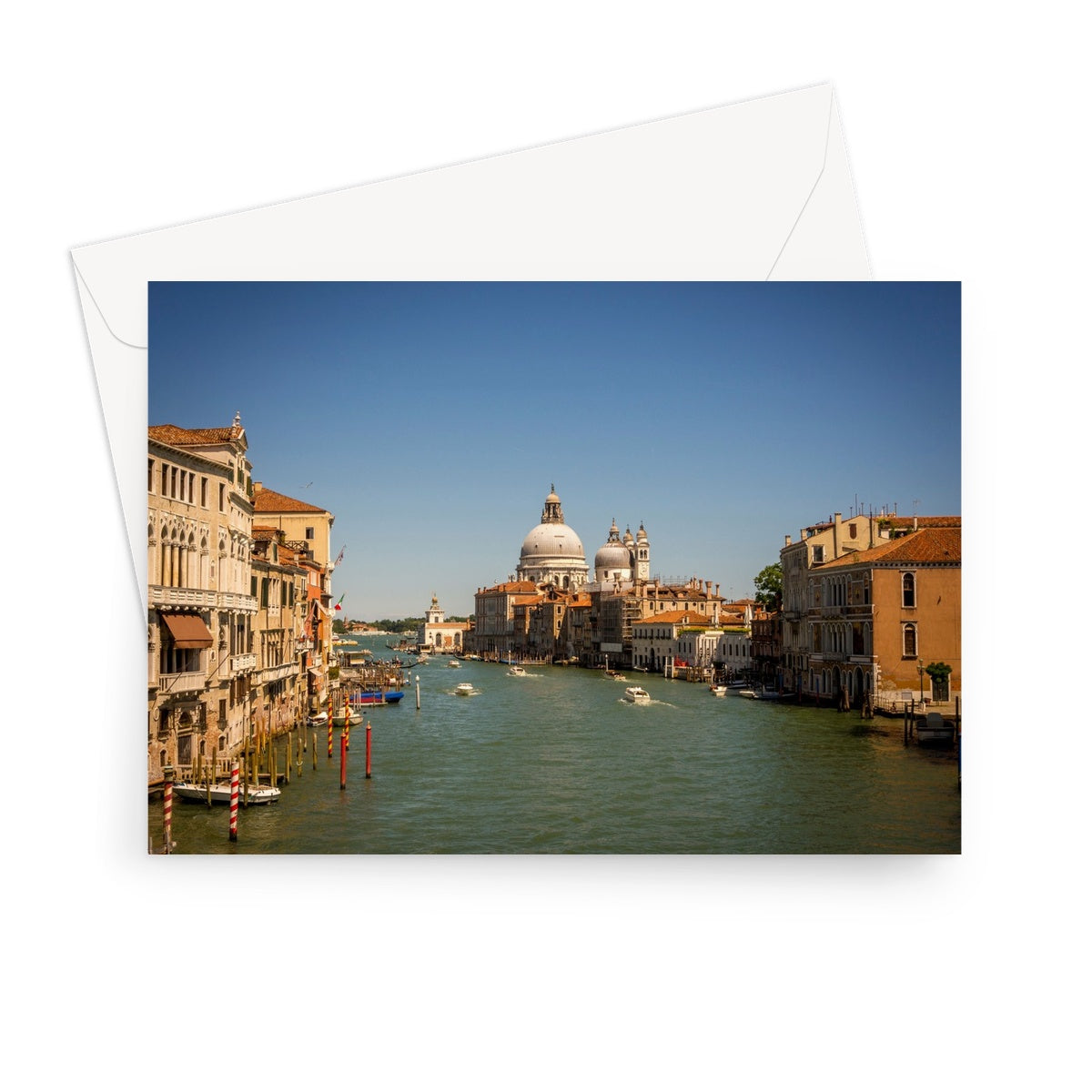 Grand canal in Venice with the domes of the church Santa Maria della  Salute in the distance Greeting Card