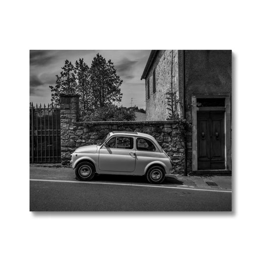 Vintage Fiat 500  car parked in Castellina in Chianti, Tuscany, Italy. Canvas