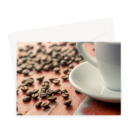 Roasted coffee beans on painted wooden board with white espresso cup and saucer Greeting Card