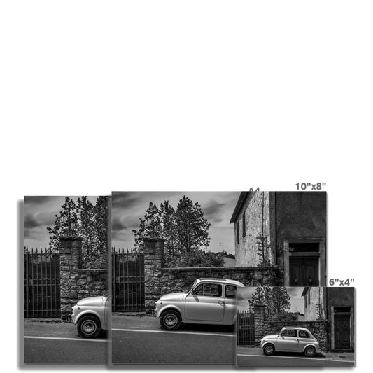 Vintage Fiat 500  car parked in Castellina in Chianti, Tuscany, Italy. Fine Art Print