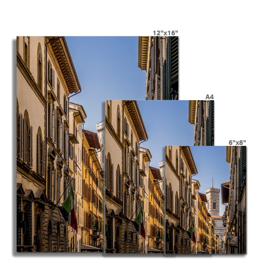 Giotto's Campanile glimpsed between buildings in the city of Florence, Italy. Fine Art Print