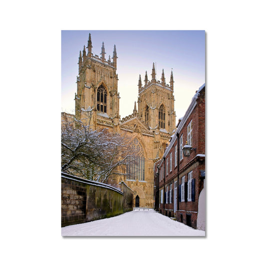 York Minster in the snow seen from Precentors Court. York, UK. Fine Art Print