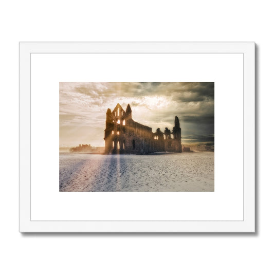 Whitby Abbey at sunset in the snow, Whitby, UK. Framed & Mounted Print