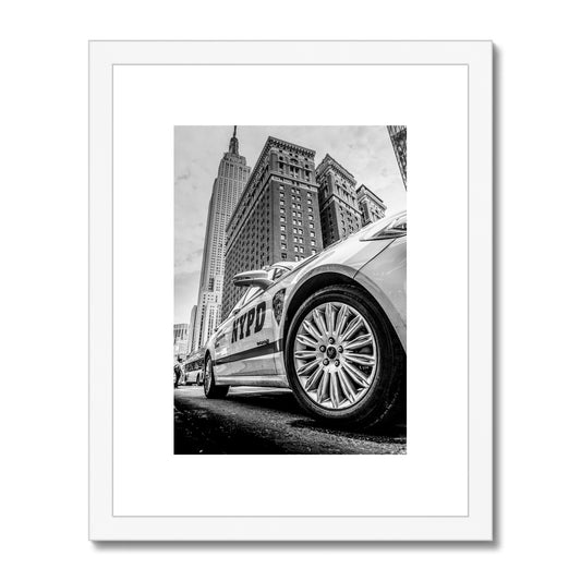 NYPD patrol car with Empire State Building on W 34th St, New York City, USA. Framed & Mounted Print