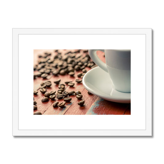 Roasted coffee beans on painted wooden board with white espresso cup and saucer Framed & Mounted Print