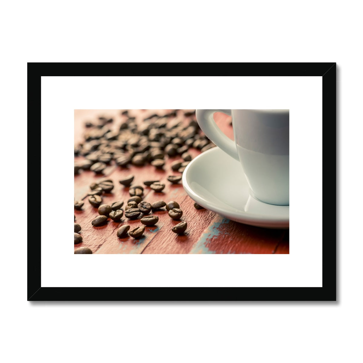 Roasted coffee beans on painted wooden board with white espresso cup and saucer Framed & Mounted Print