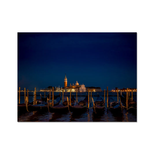 Gondolas moored in St Mark's Basin with San Giorgio Maggiore in the background at night, Venice, Italy. Fine Art Print