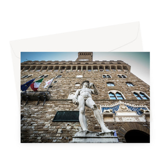 Statue of David overlooking Piazza della Signoria, with Palazzo Vecchio behind. Florence, Italy. Greeting Card