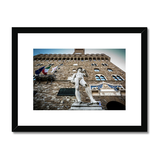 Statue of David overlooking Piazza della Signoria, with Palazzo Vecchio behind. Florence, Italy. Framed & Mounted Print