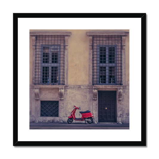 Red scooter parked outside a building in Rome, Italy. Framed & Mounted Print