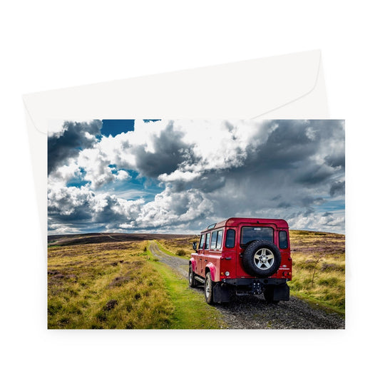 Red Land Rover Defender 110 4WD car navigating a Green Lane track, North Yorkshire Moors, UK. Greeting Card