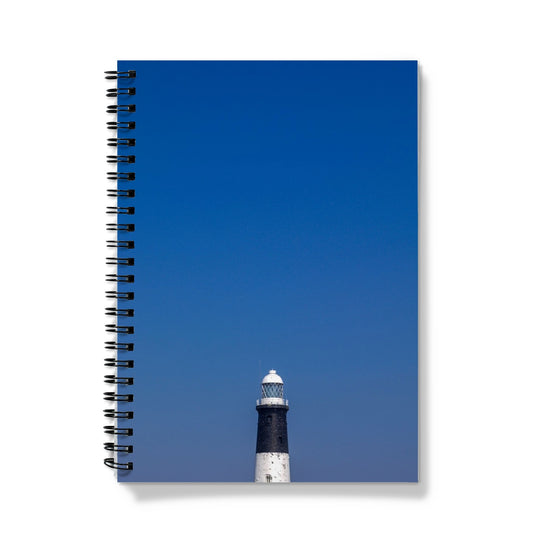 Top of a lighthouse against blue sky Notebook