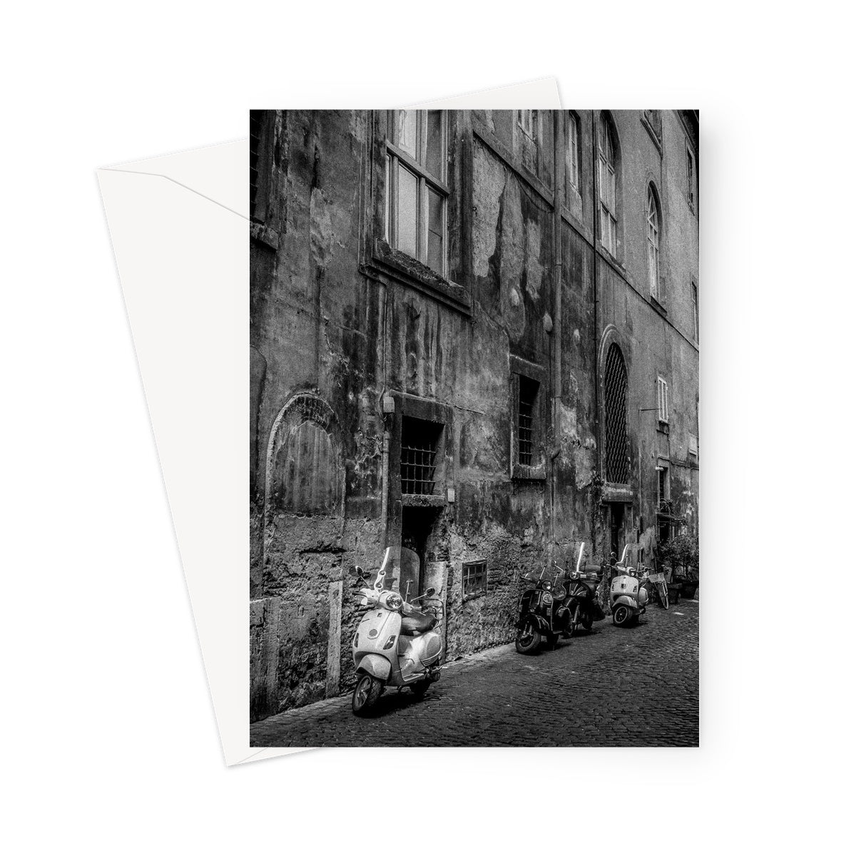 Typical street with parked scooters in the centre of Rome. Italy. Greeting Card